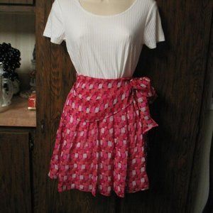 Beautiful pink mini skirt with side bow K.A.S